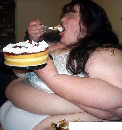 http://thebsreport.files.wordpress.com/2009/06/obese_woman_eating_cup_cake.jpg